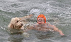 Deirdre Connolly from Newbridge, Ballinasloe, with her Goldendoodle Lilly at Blackrock for their Christmas Day swim.