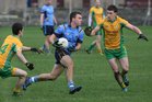 Corofin's, Ian Burke and Ronan Steede,<br />
and<br />
Salthill-Knocknacarra's, Conor O'Halloran,<br />
during the County U-21(A) Football Championship Final at Tuam Stadium.<br />
