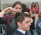 Christopher O'Connell, a student of the Holy Rosary College, Mountbellew, and GTI Hairdressing student Alina Eremia during the GTI Open Day.