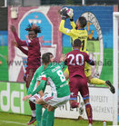 Galway United v Cork City FC SSE Airtricity League First Division game at Eamonn Deacy Park.<br />
Cork City goalkeeper Mark McNulty and Wilson Waweru and Mikey Place, Galway United 