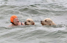 Deirdre Connolly from Newbridge, Ballinasloe, with her Goldendoodles Lilly and Millie at Blackrock for their Christmas Day swim.