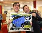 Galway Bay FM’s Neil Molloy, right, officially opened the RehabCare Art Exhibition in Ballybane Library. Neil is pictured at the opening with Grant McCarthy, one of the exhibition artists.