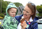 Aifric Keogh shows her Olympic medal to her nephew Jimmy Keogh at her homecoming celebrations on Monday.