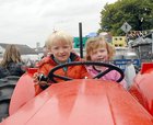 <br />
Adam Linnane and Kaycee Burke, Clarinbride, on a tractor at the Clarinbridge Market Day. 