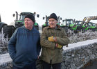 Paul Mitchell, Killimordaly, and Vincent Fahy, Ardrahan, watching tractors pass by during the Ardrahan GAA and Ardrahan IFA PJ Mahoney Memorial Tractor Run in aid of Milford Hospice and Ray of Sunshine Foundation.