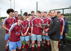 Mervue United v Maree/Oranmore FC Under 18 Premier Cup final at Drom.<br />
Tom Trill, Chairman of Galway FA, presenting the Jimmy Sullivan Cup to Conor Ffrench, Captain of Mervue United.