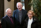 Fr. Frank Lakin, C.C., and John and Jo Mannion at the Bushypark Senior Citizens Christmas dinner party at the Westwood House Hotel.
