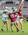 Castlegar v Clarenbridge Senior Hurling Championship at Kenny Park, Athenry.<br />
Dean Higgins and Cathal Ryan, Castlegar and Darragh Counihan and Mark Kennedy, Clarenbridge