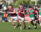 Galway v Mayo All-Ireland minor football final in Hyde Park, Roscommon.<br />
Galway’s Sean Dunne and Owen Morgan and Mayo’s Dara Hurley