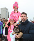 Brittany Heneghan with her husband Paul Heneghan from Turloughmore and their Daughter Macailin, who are living in Boston, before the start of the 2023 Fields of Athenry 10k Road Race, in which Brittany ran, on St Stephen's Day. 