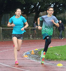 Twins Jennifer and Justin McCarthy from Moycullen, both members of Galway City Harriers, taking part in the Goal Mile at Dangan on Christmas Day.