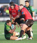 Connacht v Emirates Lions BKT United Rugby Championship game at Dexcom Stadium.<br />
Connacht's Tadgh McElroy tackled by and Reinhard Nothnagel and PJ Botha, Emirates Lions