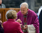 Bishop Brendan Kelly gives out holy communion during the annual Solemn Novena to Our Lady of Perpetual Help at Galway Cathedral.