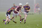 Galway v Wexford Round two of the Allianz Dvivision 1B hurling league at the Pearse Stadium.<br />
Galway's Jason Flynn and Wexford's Diarmuid O'Keeffe and Liam Ryan
