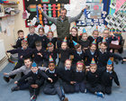 Gary Thornton celebrates with his Senior Infants Class at Claddagh National School.