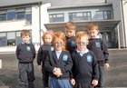 Three sets of twins front  Saoirse Ni Bhanáin and Oisin O Banáin, Aaron O Conchúir, Chloe Ni Chonchúir, Liam O Laoire and Niall O Laoire, on their first day at Scoil na bhForbacha. 