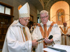 Bishop Brendan Kelly, the new Bishop of Galway, Kilmacduagh and Apostolic Administrator of Kilfenora, is presented with the crucifix by Canon Michael McLoughlin, outgoing Diocesan Administrator, during his Installation as Bishop of Galway at Galway Cathedral on Sunday. 