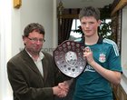 Caolan Maloney was presented with the Cian Comerford Best Under 16 Defender Perpetual Shield at the Barna Furbo United FC annual awards presentation at the Connemara Coast Hotel. Our photograph shows Francis Comerford, father of Cian, presenting the shield to Caolan.