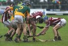 Clarinbridge's, Eanna Murphy, Mark Kerins and Shane Burke,<br />
 and<br />
 Craughwell's, Damien Rooney, John Ryan and Mark Horan,<br />
during the Senior Hurling Championship semi-final<br />
at Kenny Park Athenry.