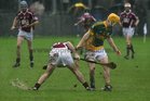 Clarinbridge's, Paul Coen,<br />
 and<br />
 Craughwell's, Ger O'Halloran,<br />
during the Senior Hurling Championship semi-final<br />
at Kenny Park Athenry.