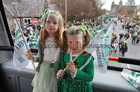 Sisters Saorla and Siómha Hughes from Bushypark on board the bus which led the St Patrick's day parade from University Road to Eyre Square.