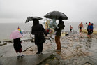 The rain comes down at Blackrock during the COPE Galway Christmas Day Swim