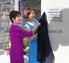 Bríd Ní Neachtain, Príomhoide, and Hildegarde Naughton, Minister of State at the Department of Transport, during the unveiling of a plaque on the new extension to Scoil Fhursa at Nile Lodge. 