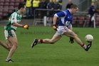 Kilconly's, Kevin Brady,<br />
and<br />
Oughterard's, Eddie O'Sullivan,<br />
during the Intermediate Football Championship Final<br />
Replay at Pearse Stadium.<br />
