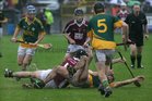 Clarinbridge's, Mark Kerins and Eanna Murphy,<br />
 and<br />
 Craughwell's, Damien Rooney, John Ryan and Mark Horan,<br />
during the Senior Hurling Championship semi-final<br />
at Kenny Park Athenry.
