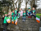 Young spectators ready to watch the Galway City St Patrick’s Day Parade pass down University Road.