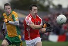 <br />
Corofin's,  Michael Lundy,<br />
and<br />
Tuam Stars, Jamie Murphy,<br />
during the County Senior Football Championship Final<br />
at Tuam Stadium.<br />
