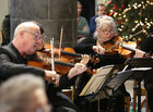 Dave Clarke and Yvette Gorham from the Corrib String Quartet accompanying the children of St. Nicholas’ Parochial School at their Carol Service and Nativity Play in St. Nicholas’ Collegiate Church last Friday.