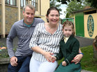 Grace O’Connor pictured with her parents Gwen Byrne and Cormac O’Connor, Knocknacarra, at Scoil Ide, Ard na Mara, after finishing her first day at school.