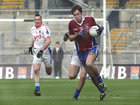 Clonbur's, Eamon O Cuiv,<br />
and<br />
Derrytresk's, Pat Campbell,<br />
during the All-Ireland Junior Club Football Championship Final at Croke Park.