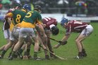 Clarinbridge's, Eanna Murphy, Mark Kerins and Shane Burke,<br />
 and<br />
 Craughwell's, Damien Rooney, John Ryan and Mark Horan,<br />
during the Senior Hurling Championship semi-final<br />
at Kenny Park Athenry.