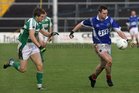 <br />
Kilconly's, John Paul Steede,<br />
and<br />
Oughterard's, Chris O'Toole,<br />
during the Intermediate Football Championship Final<br />
Replay at Pearse Stadium.<br />
