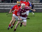 <br />
 Clarinbridge's, Paul Coen,<br />
 and<br />
 St. Thomas, Justin Kelly,<br />
 during the Senior Hurling Championship at Athenry.<br />
