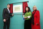 Jack Chambers TD, Minister of State for the Gaeltacht and Sport, Máire De Brún, Principal, and Patricia Coleman, Chairperson, during the unveiling of a plaque to mark the official opening of the new Scoil Bhríde Mionloch.