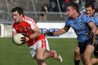 <br />
Salthill-Knocknacarra's, Conor Halloran,<br />
and<br />
Tuam Stars, Jamie Murphy,<br />
during the Senior Football Championship semi-final<br />
at Pearse Stadium.<br />
