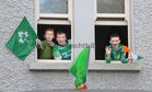 Young spectators at University Road at the start of the St Patrick's Day Parade.