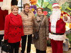 Mary Alone, Judy Noone and Mary Joans are joined by Santa on their arrival to the Mervue and Renmore Community Christmas lunch in the Connacht Hotel.