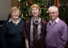 Agnes Gilligan and Mary and Michael O'Carroll at the Bushypark Senior Citizens Christmas dinner party at the Westwood House Hotel.