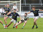 Claregalway v Moycullen Junior Football final at Pearse Stadium.<br />
Tomas McConala, Moycullen and Conor Kelly, Brian Callinan and Paul Fahy, Claregalway 