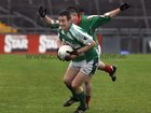 <br />
Oughterard's, Daniel Tuck,<br />
 and<br />
 Kilconly's, Barry Concannon,<br />
 during the County Intermediate Football Championship Final  at Pearse Stadium.
