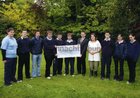 Junior Cert Students at Mountbellew Vocational School presenting a cheque for Ä1,000 to Mr. Pat McCallin 'Bothar' on the schools recent prizegiving day.<br />
Pictured are Casey Feeney, Alan Finn, Conor Nolan, Keith Gavin, James Collevy, Darren Quinn, Miss Mary Nolan (Tutor), Martin Ward, Louise Geraghty and Lisa Hughes.