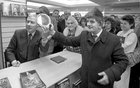 Gay Byrne receives an inscribed silver plaque from Brendan Coffey at the Eason Bookshop in Shop where he was signing copies of his book' The Time of My Life' in October 1989