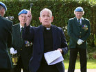 Fr Brendan Kelly, Mervue Parish, accompanied by John Gavin, during the blessing of the wreaths at the ceremony for IUNVA post 30 Galway and 60th Anniversary of the Siege of Jadotville in the Memorial Garden of Renmore Barracks.