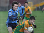<br />
Corofin's, Adrian Molloy,<br />
and<br />
Salthill-Knocknacarra's, Michael Rafferty,<br />
during the County U-21(A) Football Championship Final at Tuam Stadium.<br />
