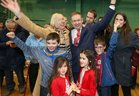 Galway West Fianna Fail candidate Eamon Ó Cuiv celebrates after his election with his wife Aine, their children Eamon Óg and Eimear, and grandchildren Aine, Mairead Eamon and Sean.