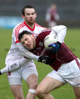 Galway v Tyrone Allianz Football League Division 2 game at the Pearse Stadium.<br />
Galway's Damien Comer and Ronan McNamee, Tyrone